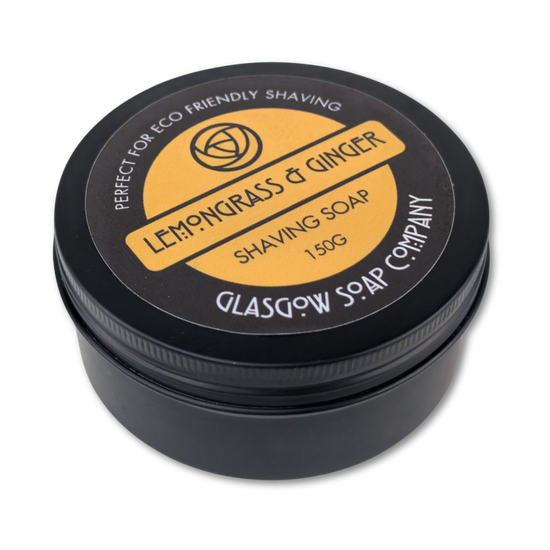 Shaving soap container with 'Lemongrass & Ginger' label on a white background