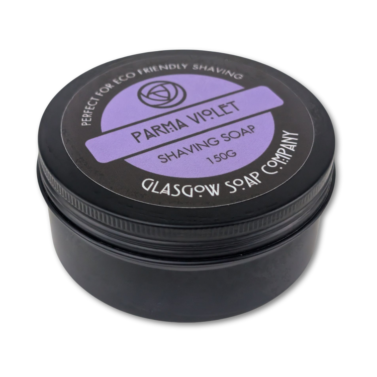 Black jar of Parma Violet shaving soap from Glasgow Soap Company on a white background