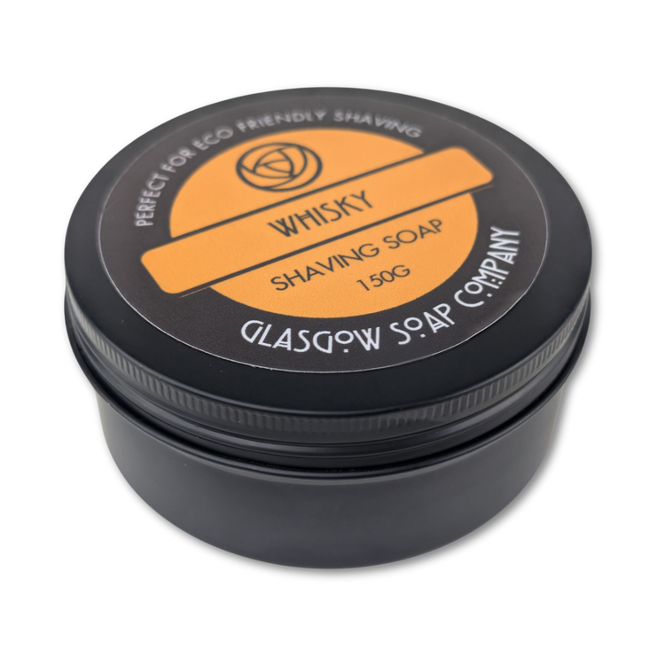 Black container of whisky shaving soap from Glasgow Soap Company on a white background