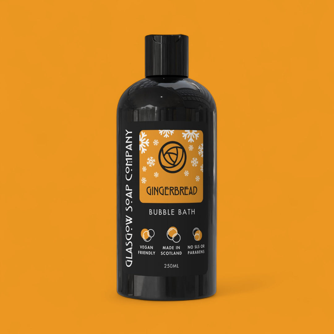 Gingerbread christmas bubble bath bottle with label on an orange background