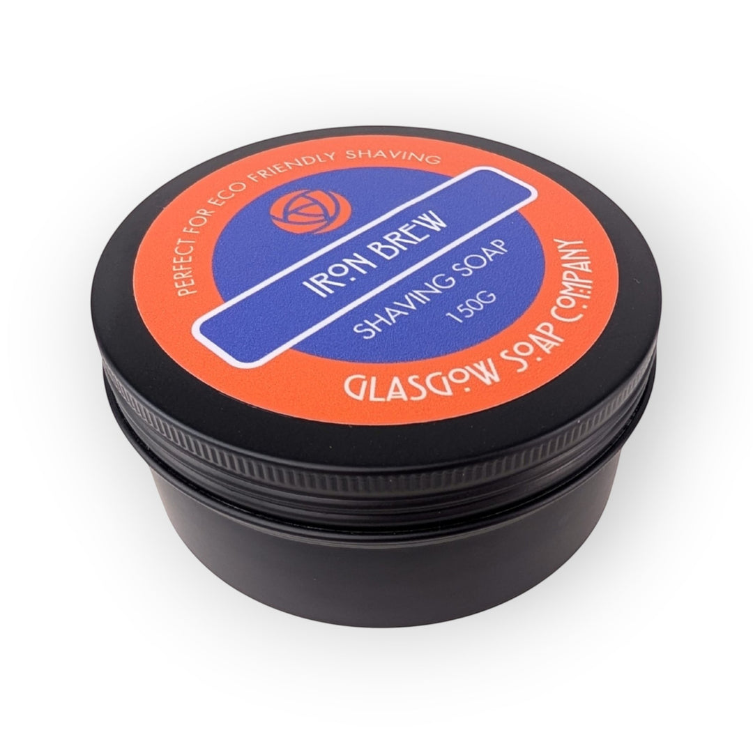 Glasgow Soap Company Ltd Iron Brew shaving soap in a black tin with orange and blue label. 150g.