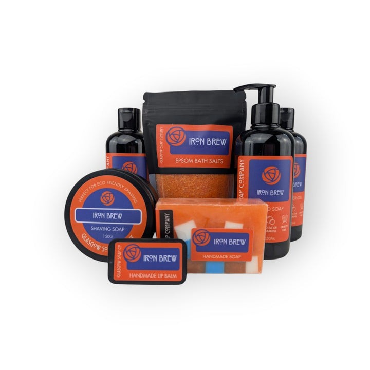 Glasgow Soap Company Ltd Iron Brew shaving soap in a tin, handmade soap, lip balm, bath salts, and shower gel.