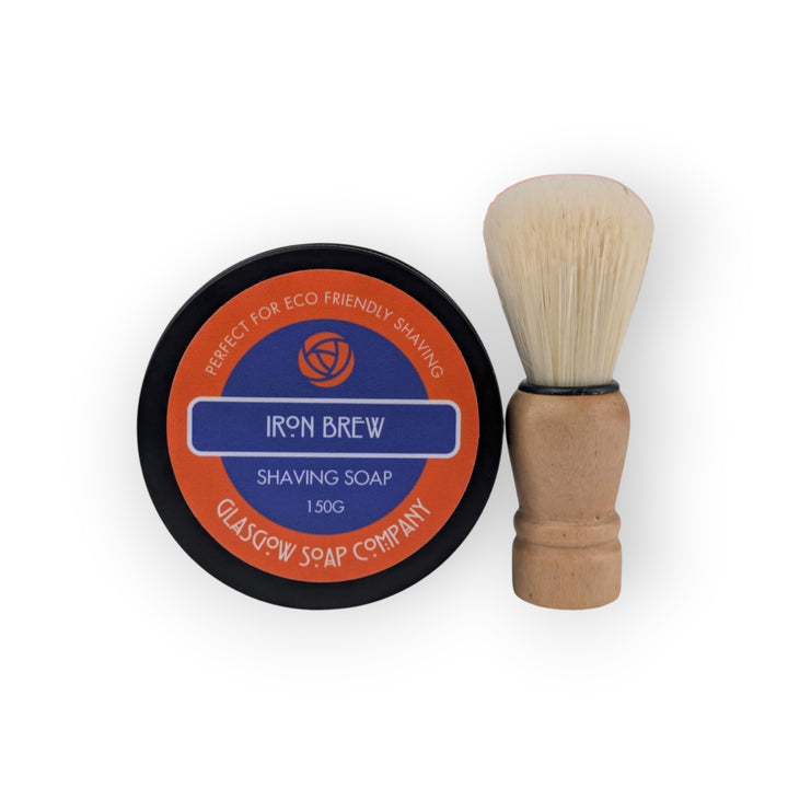 Glasgow Soap Company Ltd Iron Brew vegan shaving soap in a tin with a wooden handled brush. 150g.