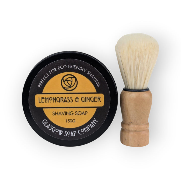 Glasgow Soap Company Lemongrass &amp; Ginger vegan shaving soap in a tin with a wooden handled brush.