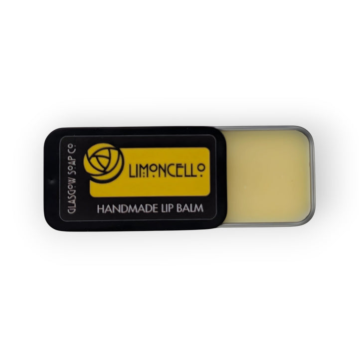 Glasgow Soap Company Ltd Limoncello handmade lip balm in a tin, with a yellow and black label and pale yellow balm.