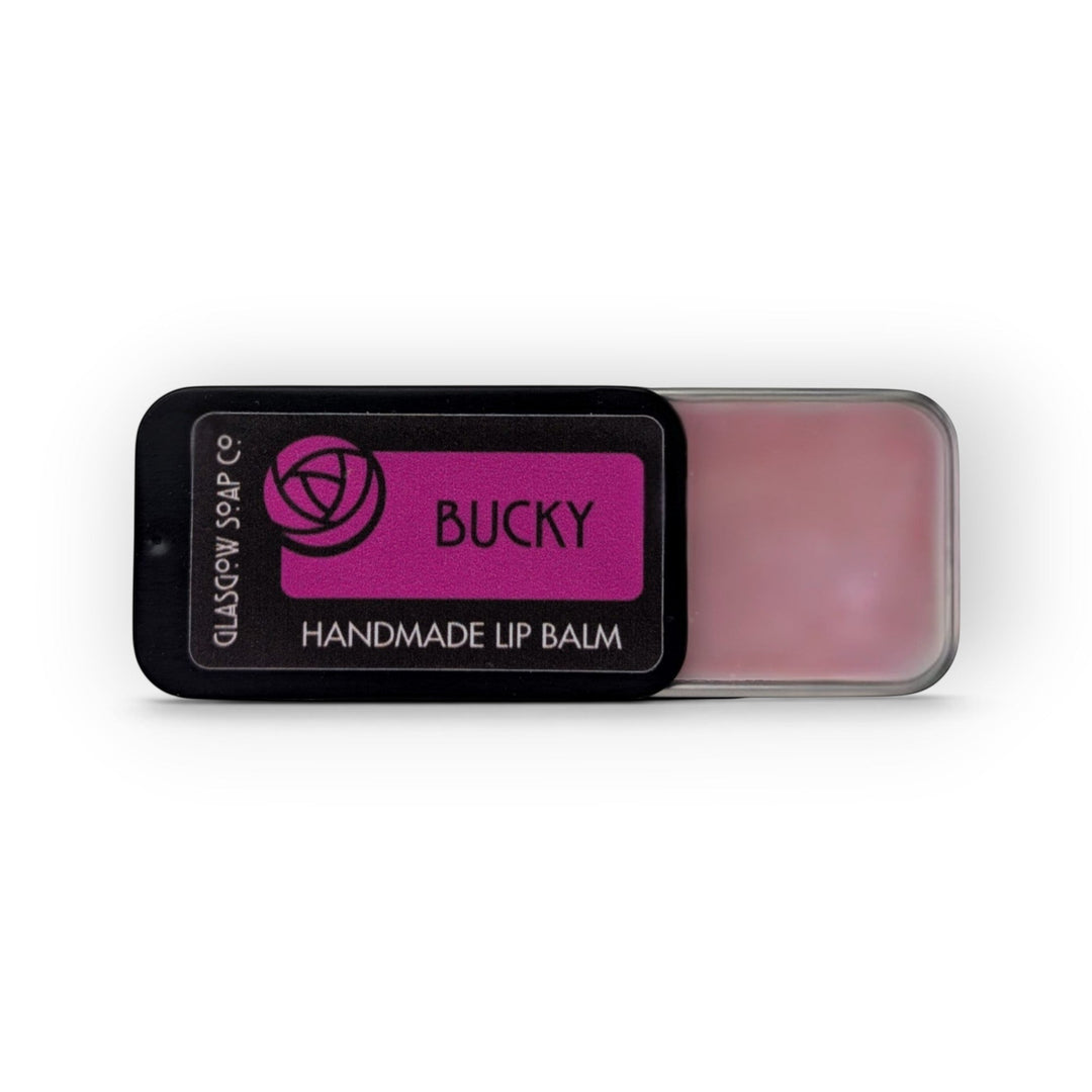Glasgow Soap Company Ltd Bucky lip balm in a sliding black tin with pink balm, handmade in Scotland.