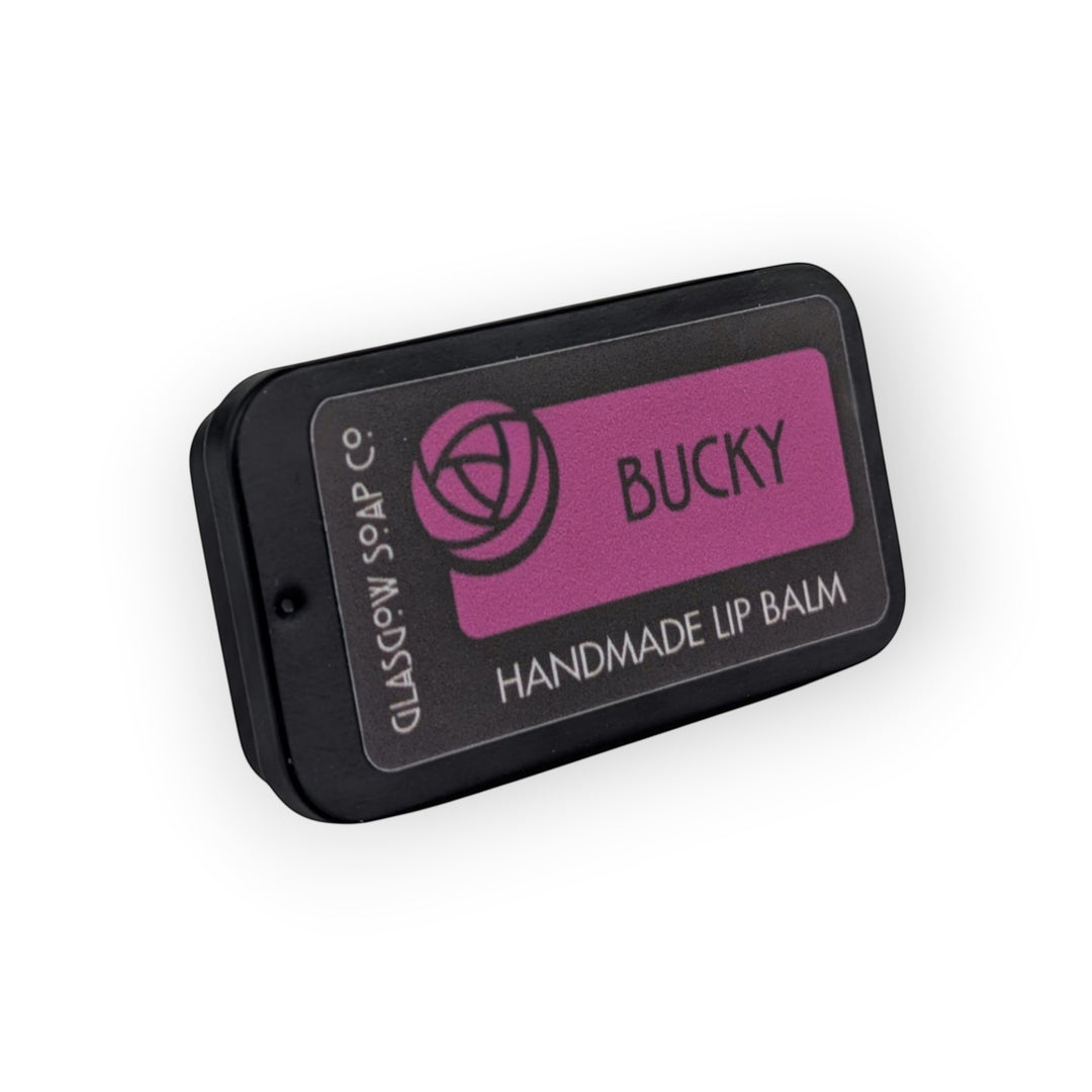 Glasgow Soap Company Ltd Bucky handmade lip balm in a black tin with a purple label.