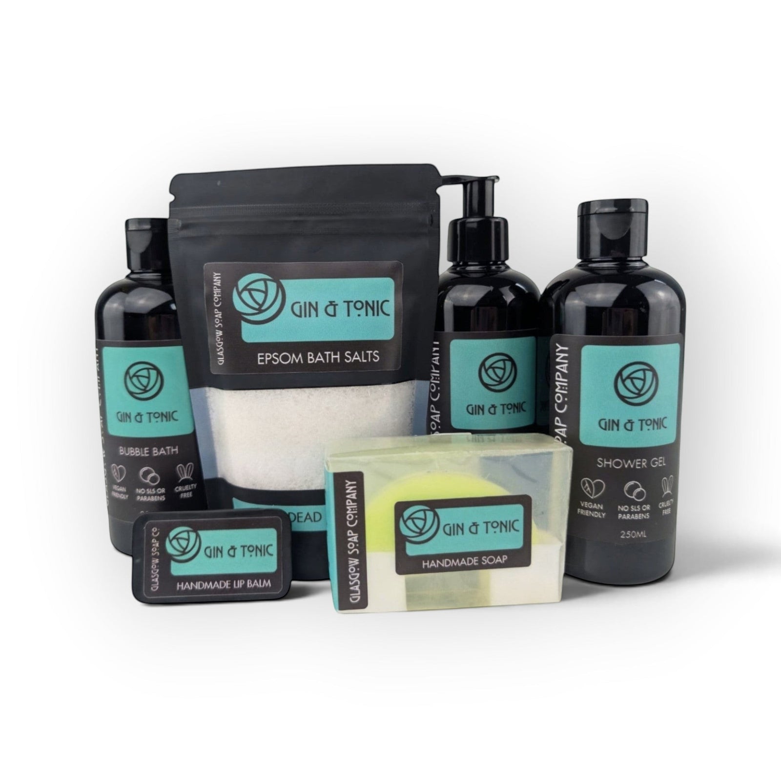 Glasgow Soap Company Ltd Gin & Tonic bath collection featuring bath salts, soap, shower gel, and lip balm in black.