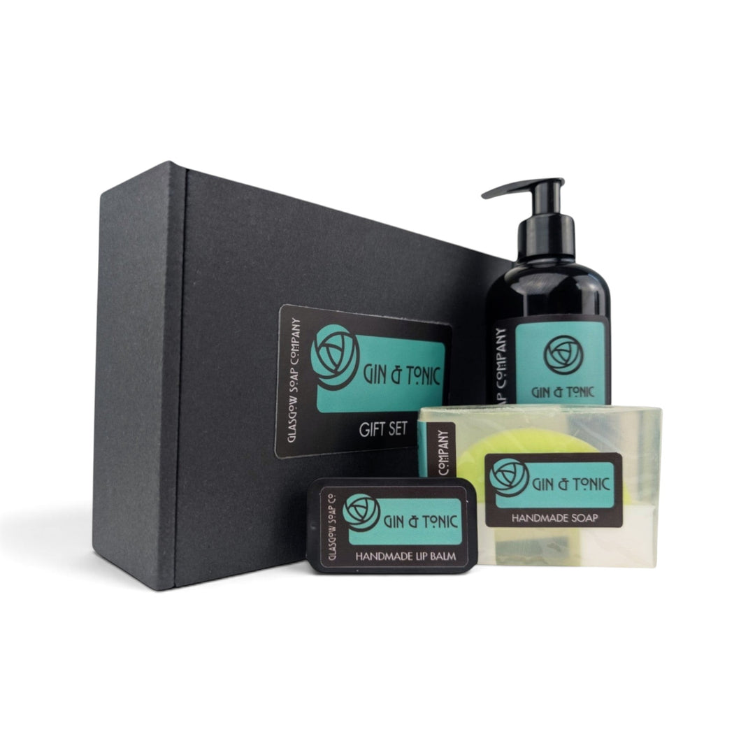 Glasgow Soap Company Ltd Gin &amp; Tonic gift set featuring liquid soap, handmade soap bar, and lip balm in a black box.