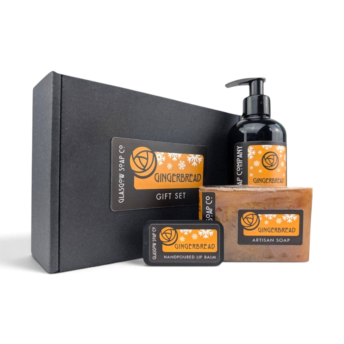 Glasgow Soap Company Ltd Gingerbread Gift Set featuring liquid soap, handmade bar soap, and lip balm in a black box.
