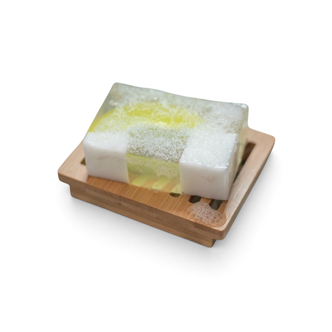 Glasgow Soap Company Ltd handmade soap bar with lime and botanical fragrance on a wooden soap dish