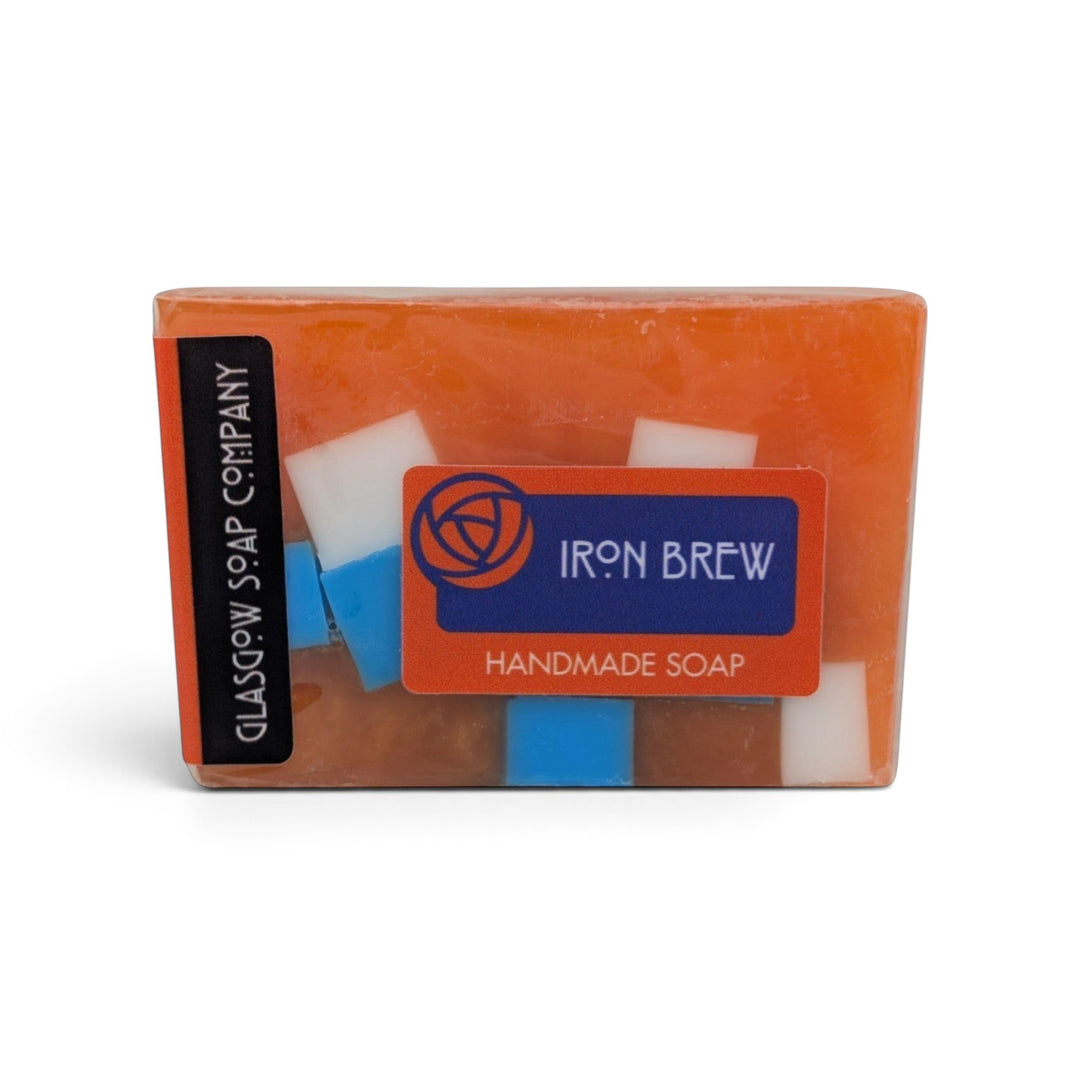 Glasgow Soap Company Ltd Iron Brew handmade soap bar with orange, white, and blue accents in biodegradable packaging.