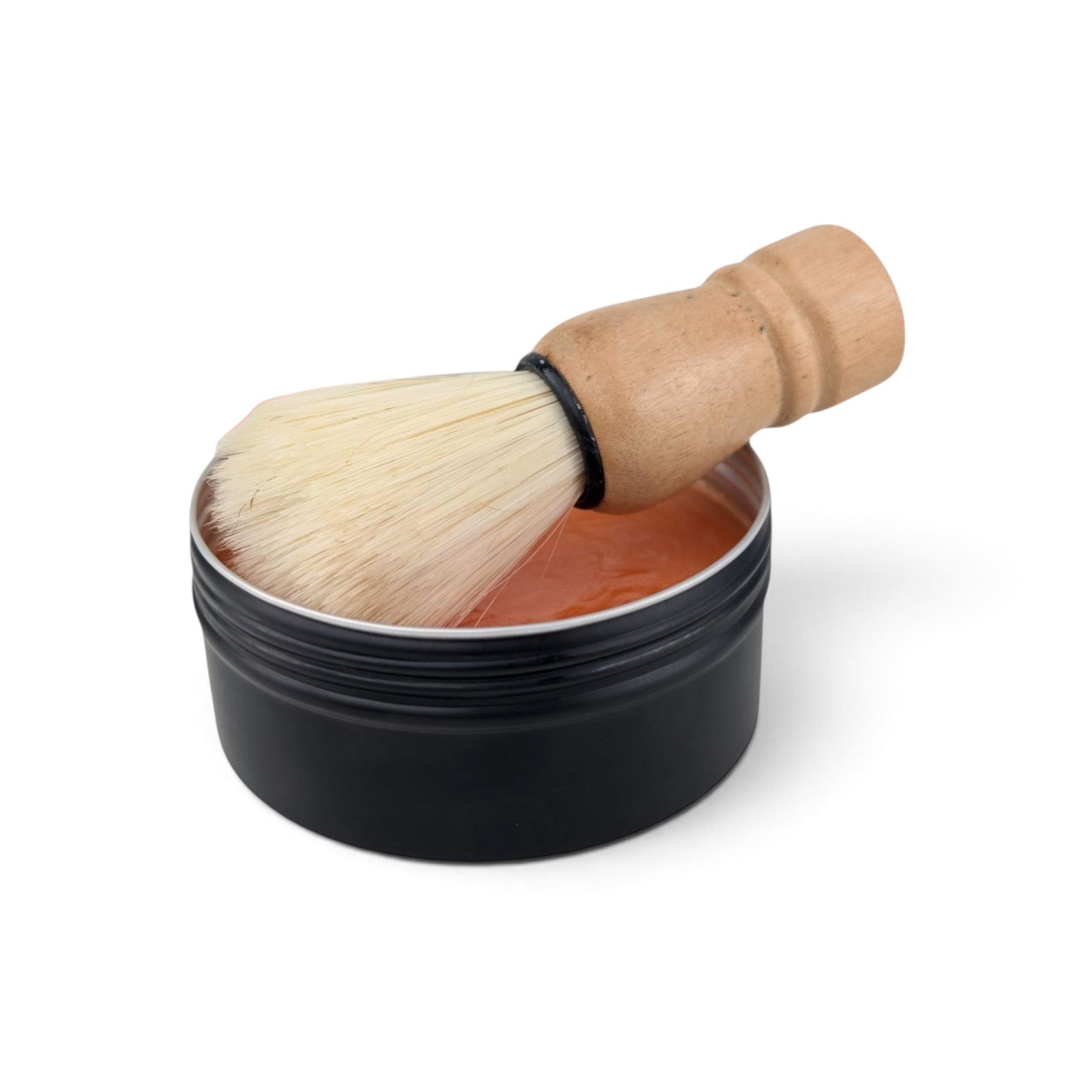 Glasgow Soap Company Ltd Iron Brew shaving soap in a black tin with a wooden vegan shaving brush
