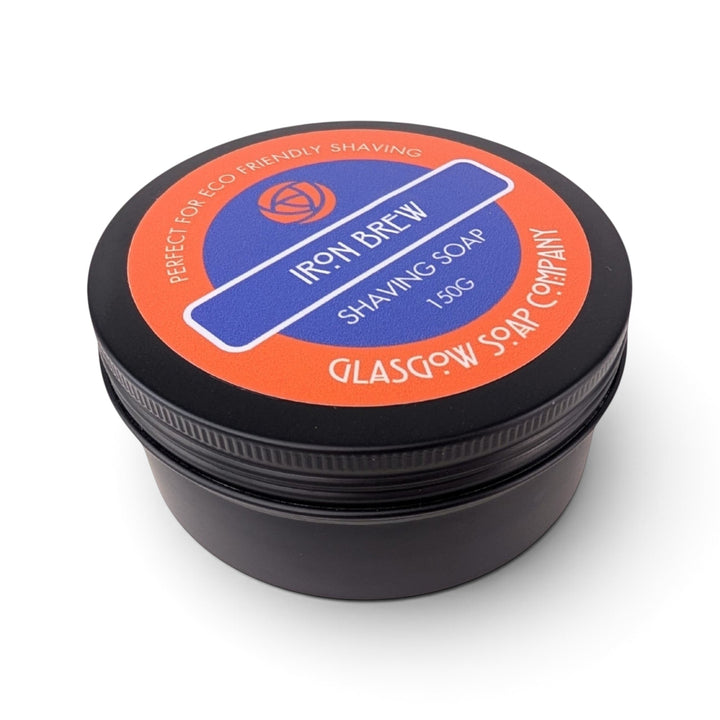 Glasgow Soap Company Ltd Iron Brew shaving soap in a black circular tin with orange and blue branding