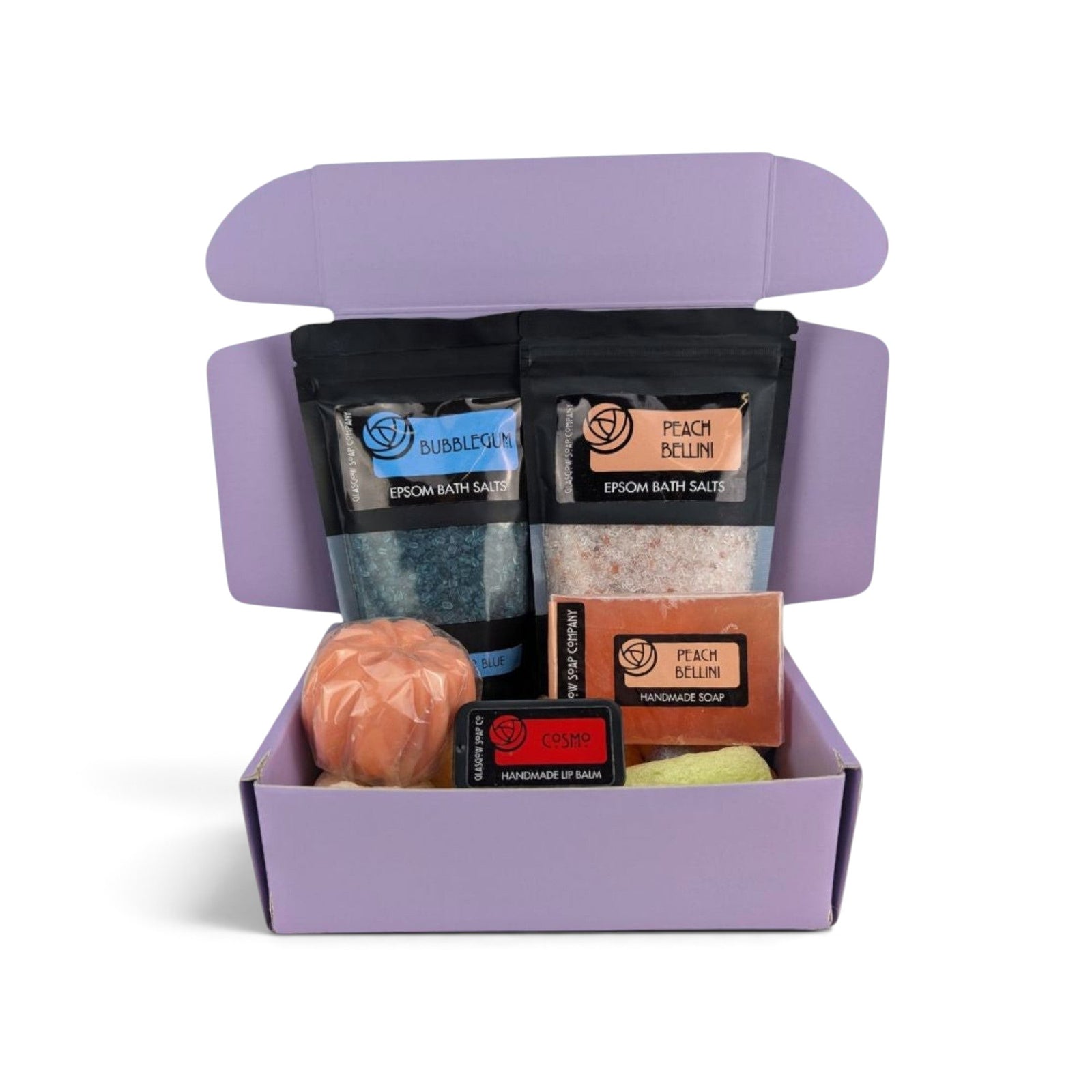 Glasgow Soap Company Ltd medium mystery box filled with assorted handmade soaps, bath salts, and lip balm.