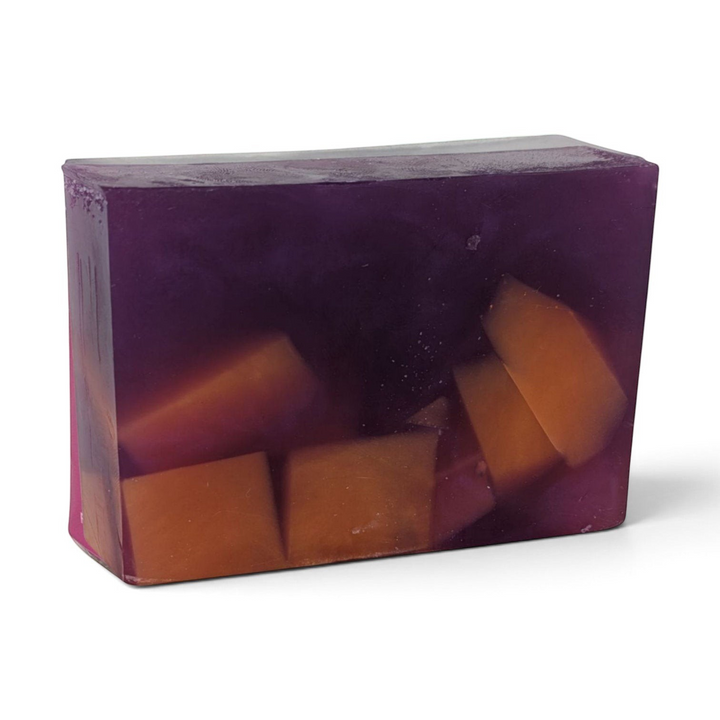 Glasgow Soap Company Ltd handmade Mulled Wine soap bar with deep purple translucent base and orange fruit inclusions