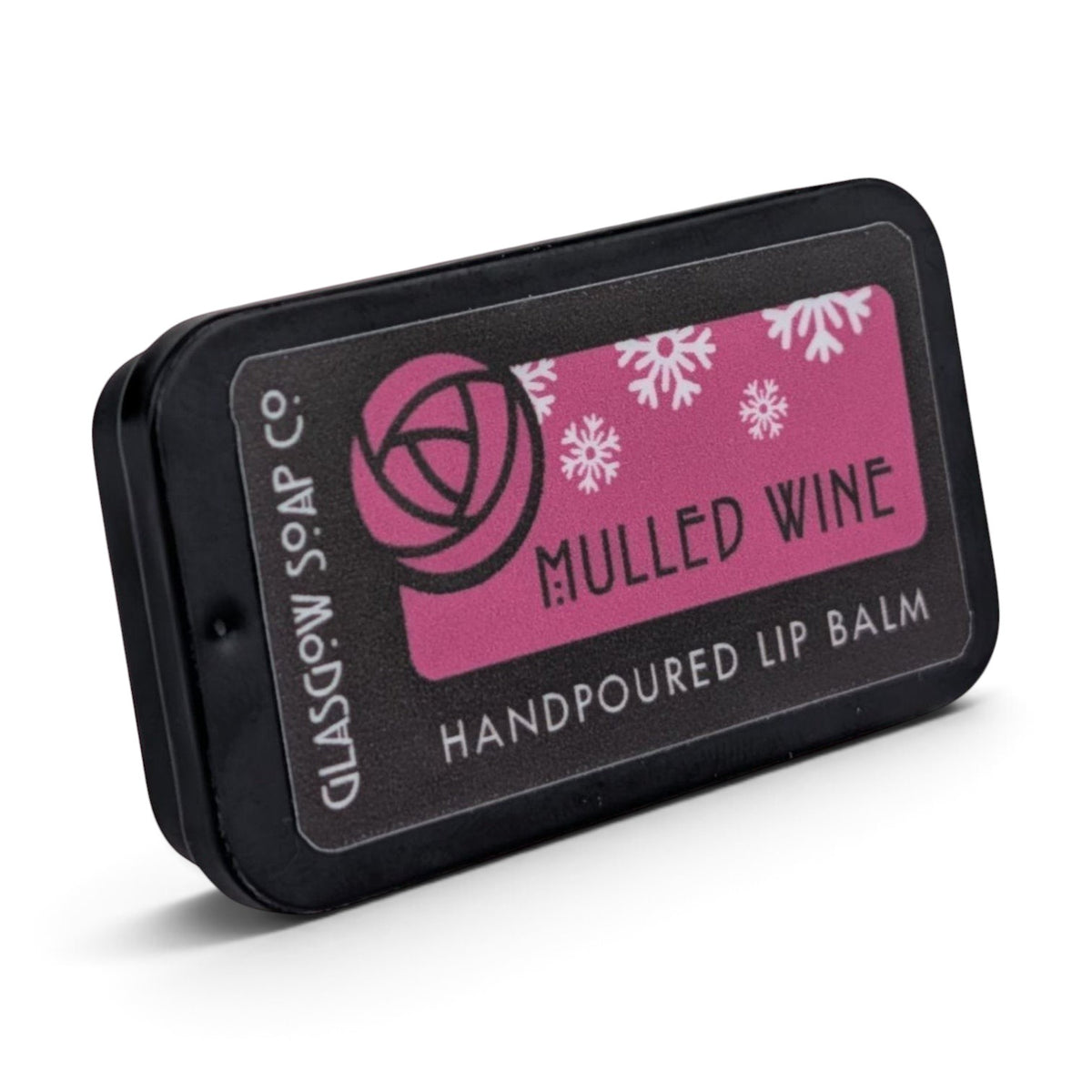 Glasgow Soap Company Ltd Mulled Wine lip balm in a black sliding tin with festive pink label and snowflake design.
