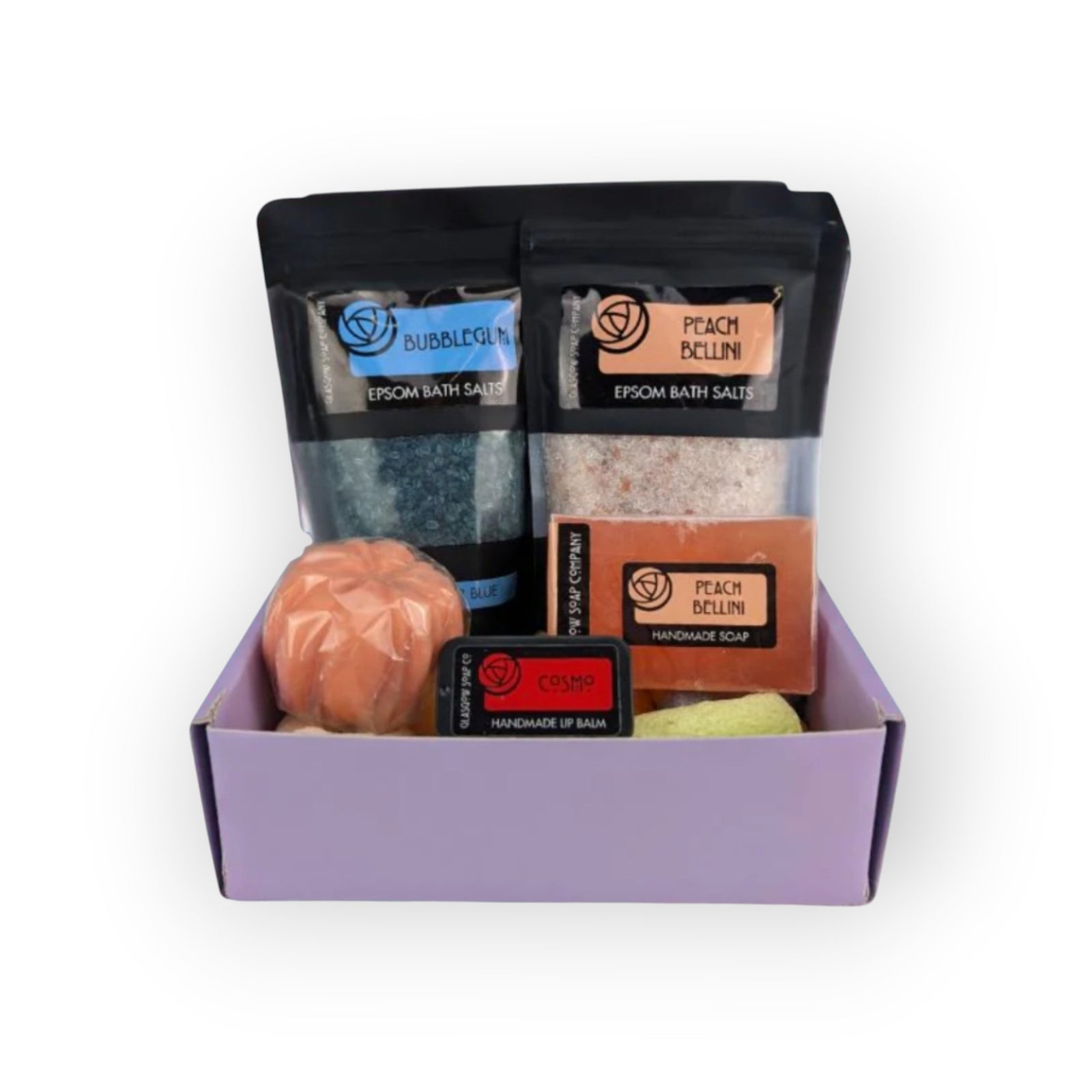 Glasgow Soap Company Ltd mystery box with bubblegum and peach bellini bath salts, handmade soap, lip balm, and bath bomb.