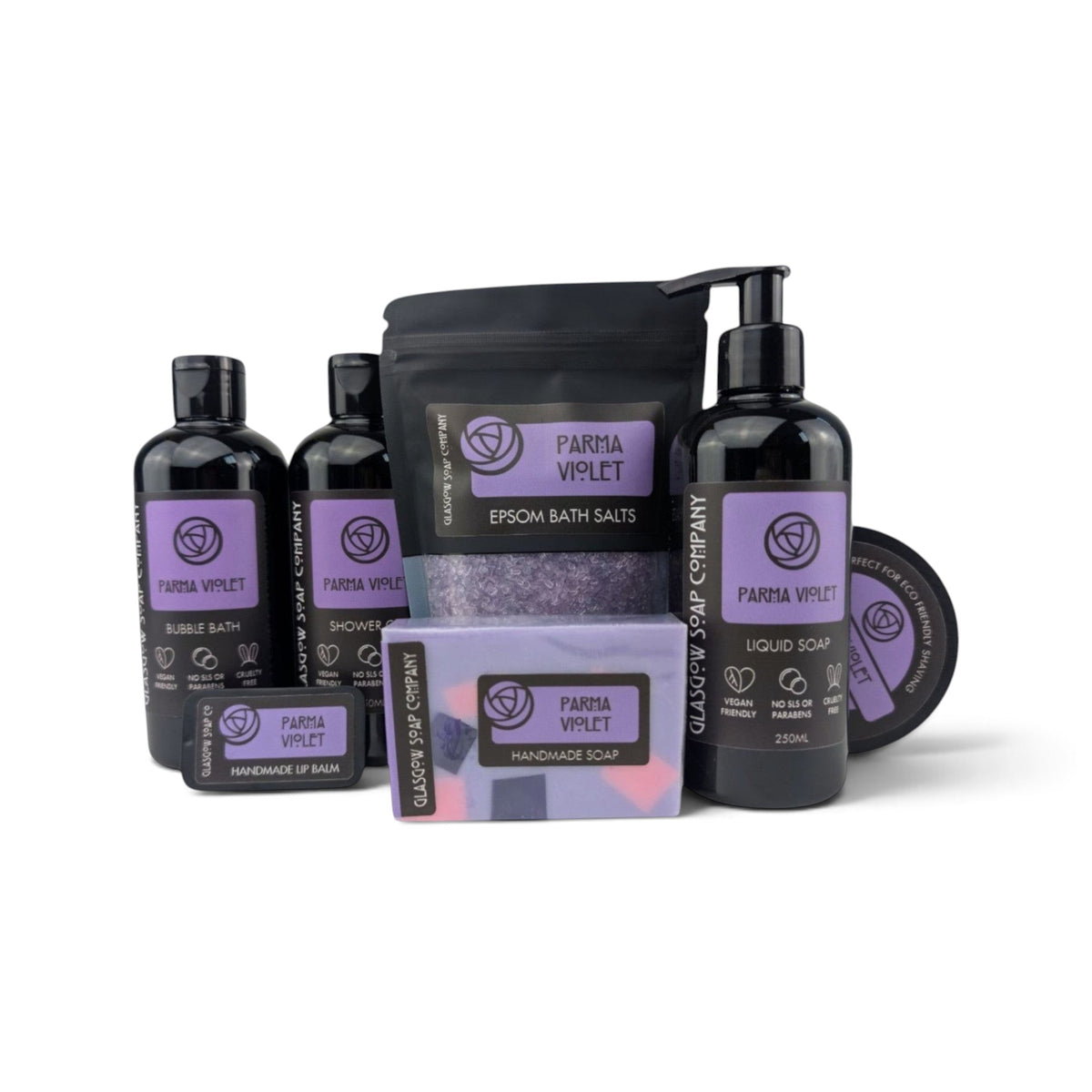 Glasgow Soap Company Ltd Parma Violet collection featuring shower gel, bath salts, bar soap, and lip balm in purple