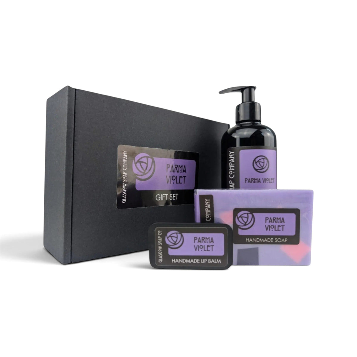 Glasgow Soap Company Ltd Parma Violet gift set featuring liquid soap, handmade soap bar, and lip balm in a black box.
