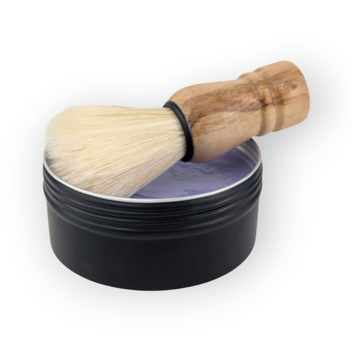 Glasgow Soap Company Ltd Parma Violet shaving soap in black tin with wooden handled vegan shaving brush.