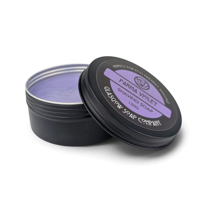 Glasgow Soap Company Ltd Parma Violet shaving soap in a black metal tin with a purple label and purple soap inside