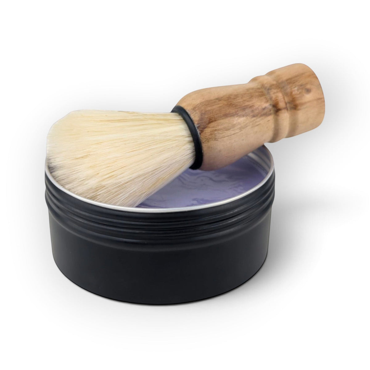 Glasgow Soap Company Ltd Parma Violet shaving soap in a black tin with a wooden vegan shaving brush