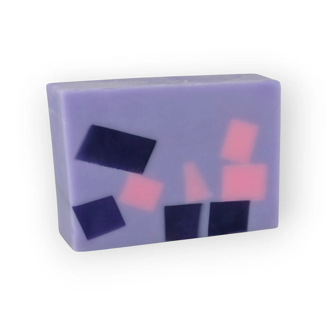 Glasgow Soap Company Ltd Parma Violet handmade soap slice with purple and pink geometric shapes.
