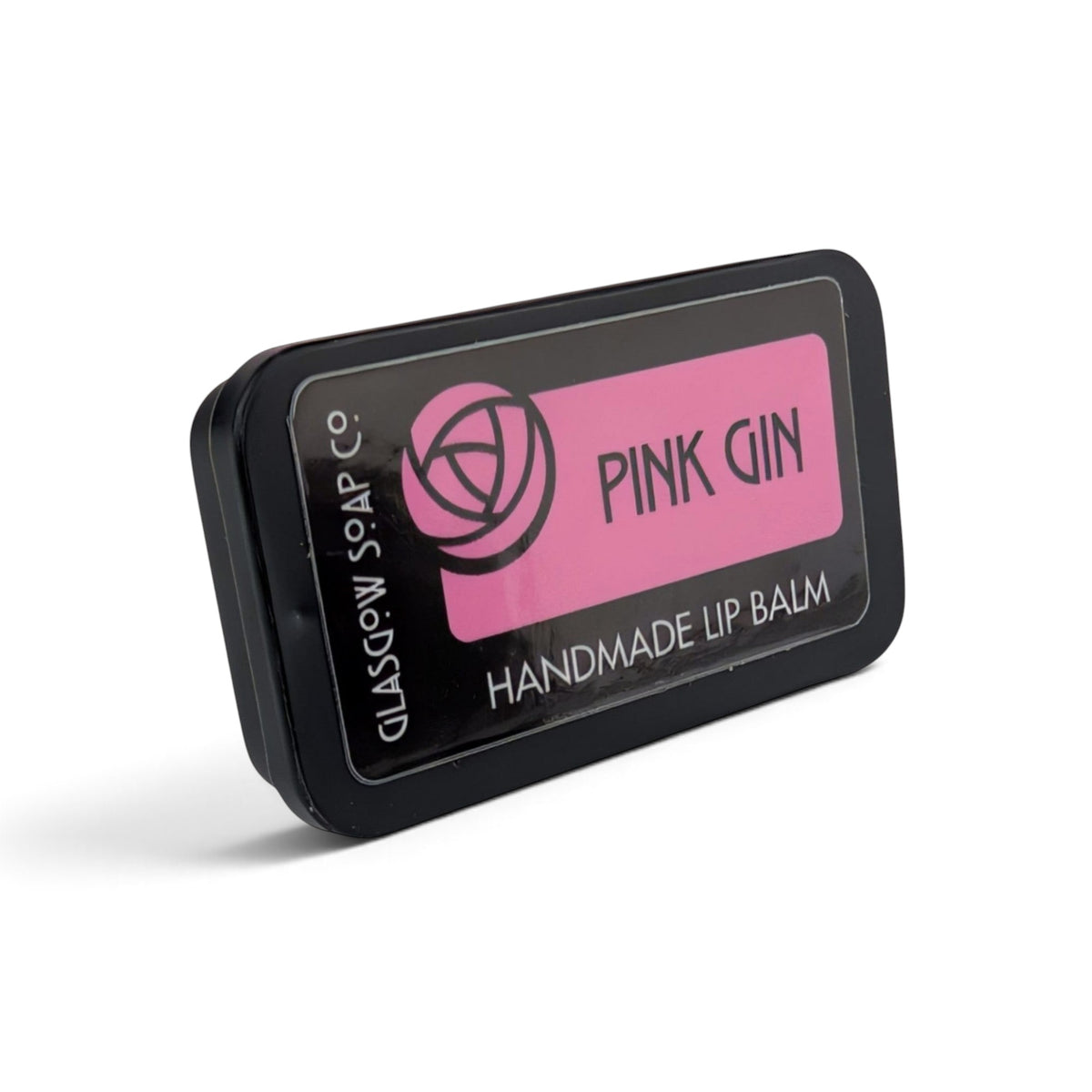 Glasgow Soap Company Ltd Pink Gin flavoured lip balm in a small black sliding tin with a pink label