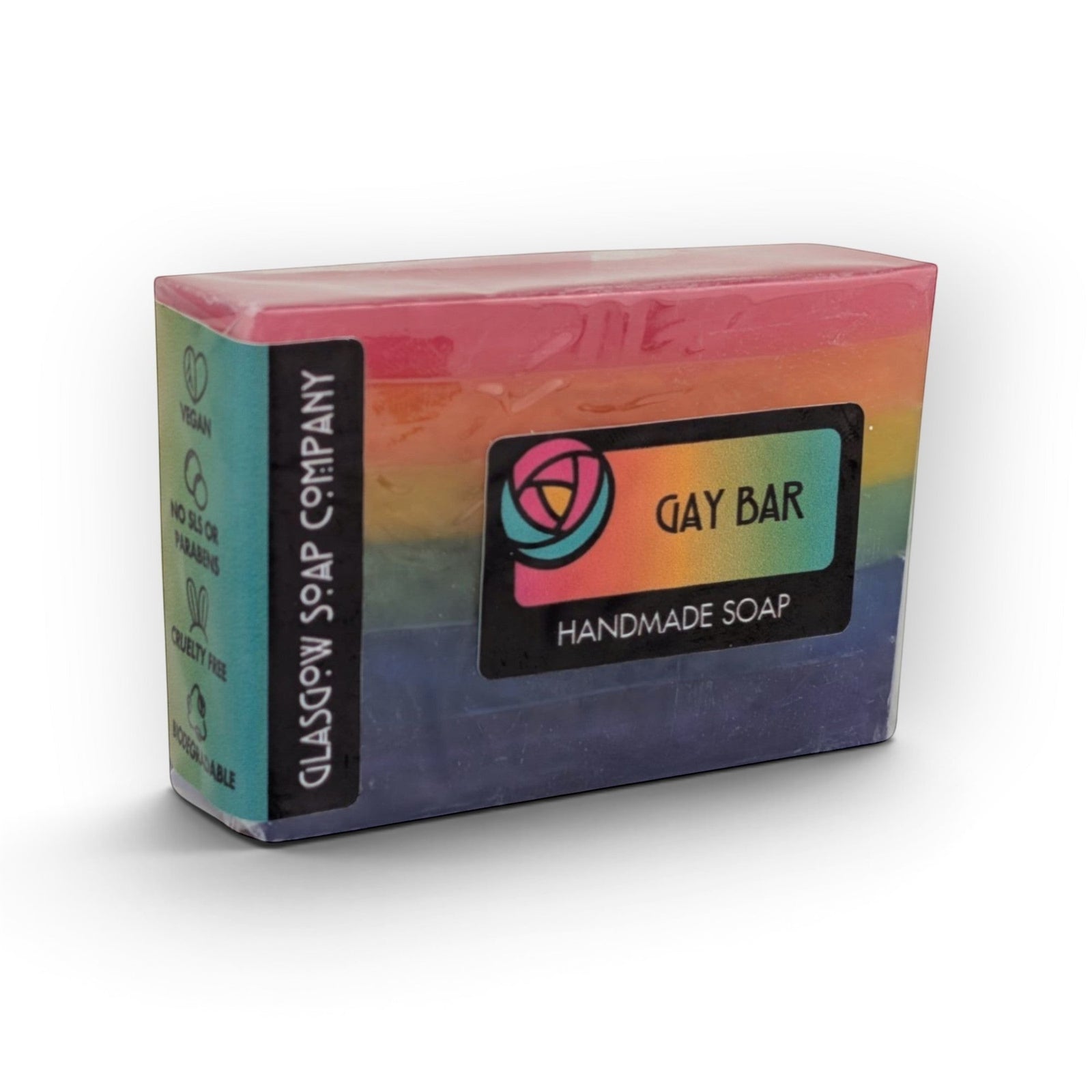 Glasgow Soap Company Ltd rainbow-striped Gay Bar soap with bubblegum and fruity scent in biodegradable packaging.