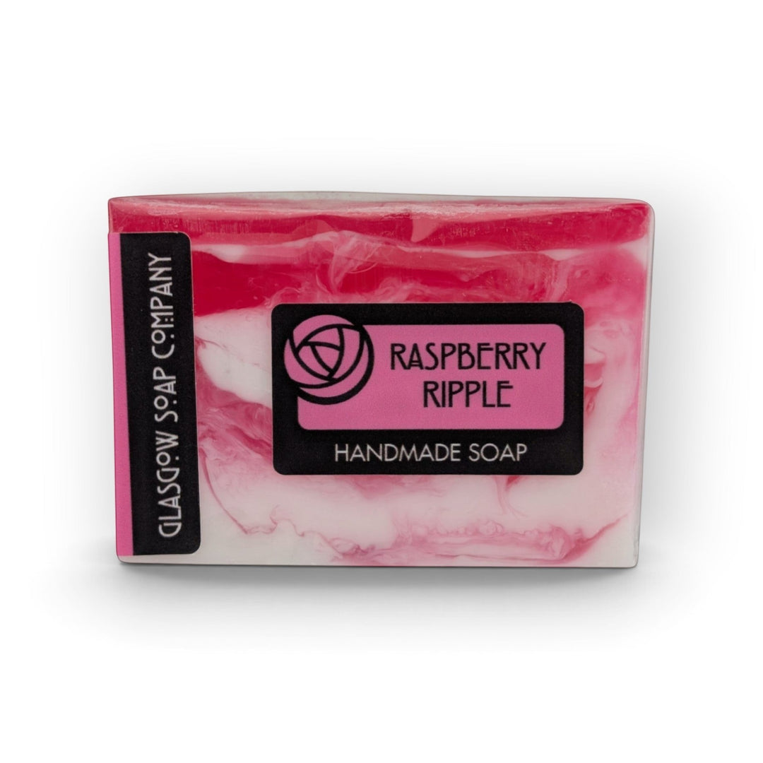 Glasgow Soap Company Ltd Raspberry Ripple handmade soap bar with pink and white swirls and a sweet fruity fragrance.