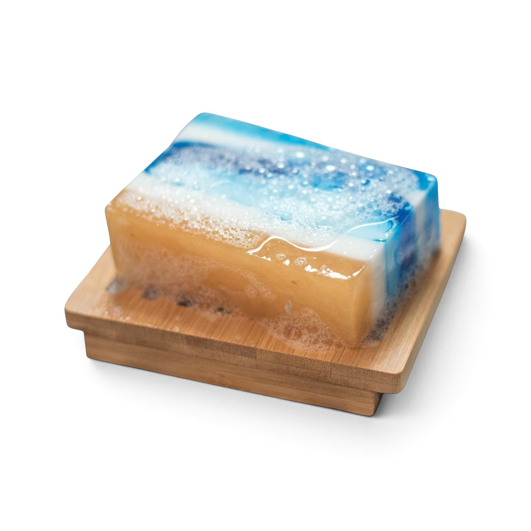 Glasgow Soap Company Ltd Sea Salt &amp; Driftwood soap bar with blue and sand swirls on a wooden soap dish