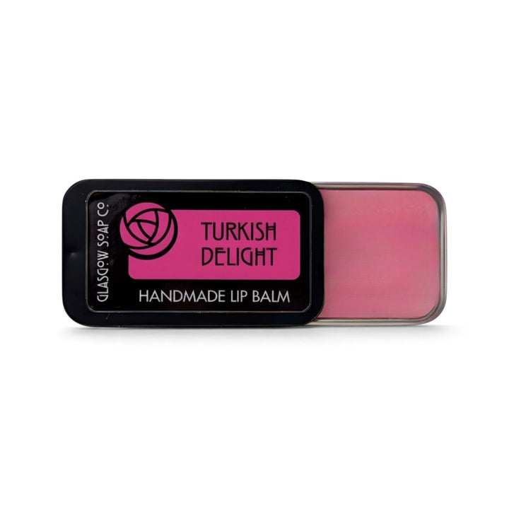 Glasgow Soap Company Ltd Turkish Delight rose-flavoured lip balm in a sliding black tin with pink balm visible