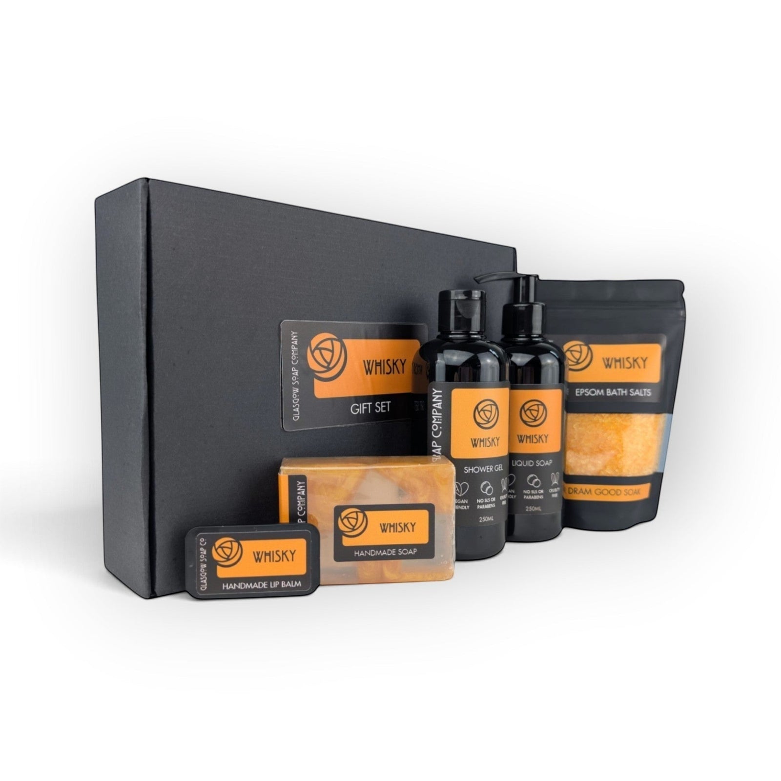 Glasgow Soap Company Ltd whisky gift set featuring liquid soap, shower gel, bath salts, handmade soap, and lip balm.