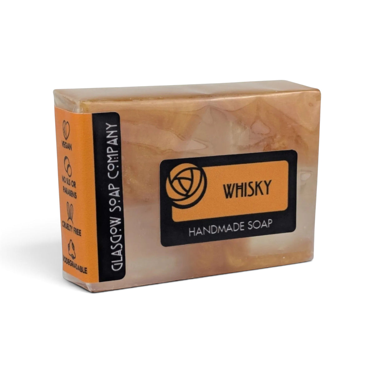 Glasgow Soap Company Ltd handmade whisky soap bar with amber swirls and vegan label in biodegradable packaging.