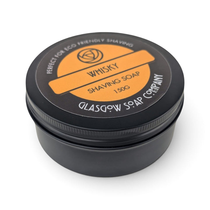 Glasgow Soap Company Ltd Whisky Shaving Soap in a black recyclable aluminium tin with orange label