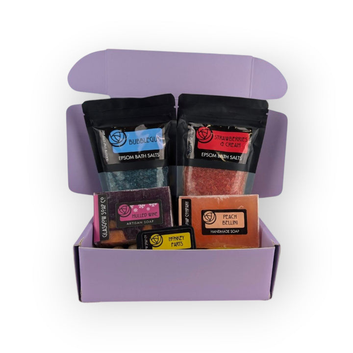 Glasgow Soap Company Ltd limited edition mystery box with bubblegum &amp; strawberries &amp; cream bath salts, mulled wine &amp; peach bellini soaps.