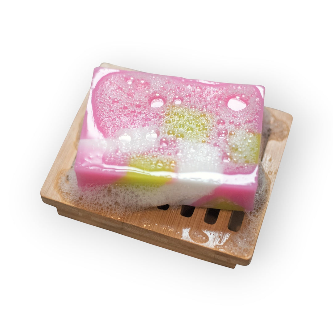 Glasgow Soap Company Ltd Scottish Rose large gift set with pink, white, and green marbled soap on a bamboo soap dish with lather.