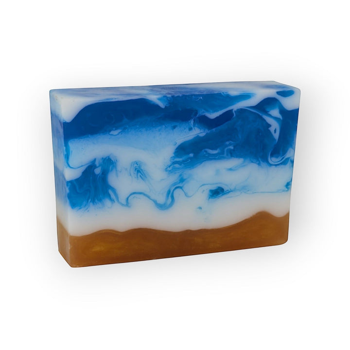 Glasgow Soap Company Ltd sea salt and driftwood soap bar with blue ocean waves and sandy shore design. Vegan, SLS &amp; Paraben Free.
