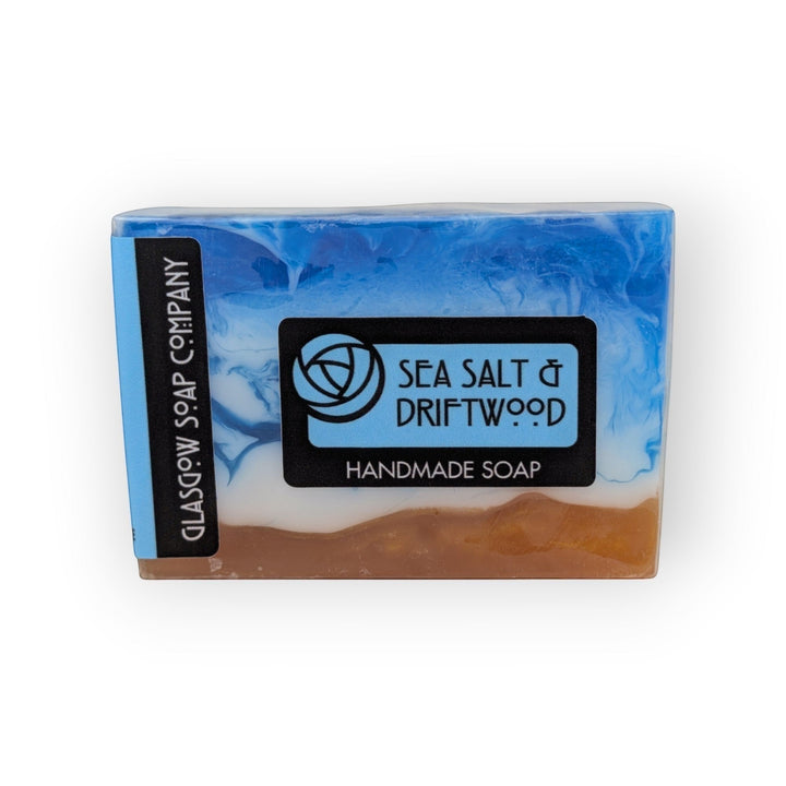 Glasgow Soap Company Ltd Sea Salt &amp; Driftwood handmade soap bar with blue ocean swirls and brown sand layers.