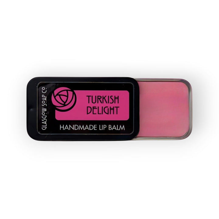 Glasgow Soap Company Ltd Turkish Delight handmade lip balm in a pink shade, made with coconut oil, shea butter, and beeswax.