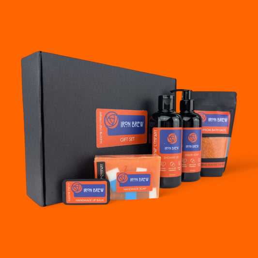 Iron Brew gift set with various products on an orange background