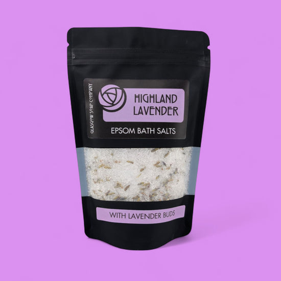 Pack of Highland Lavender Epsom bath salts on a purple background