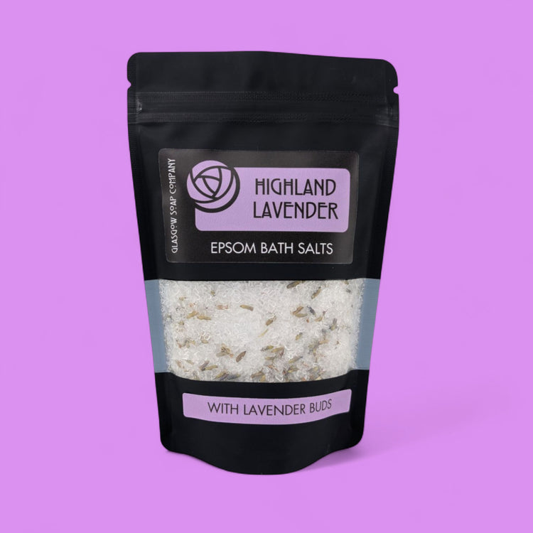 Pack of Highland Lavender Epsom bath salts on a purple background