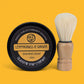 Shaving soap container and brush with 'Lemongrass & Ginger' label on a yellow background