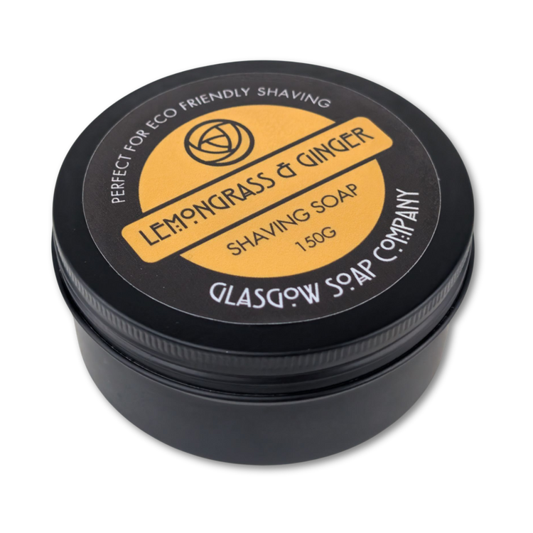 Shaving soap container with 'Lemongrass & Ginger' label on a white background