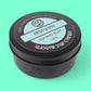Shaving soap container with 'Meditation' and 'Glasgow Soap Company' branding on a teal background