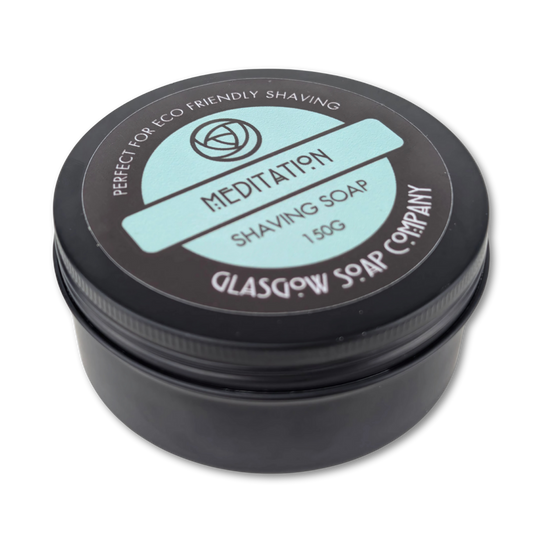Shaving soap container with 'Meditation' label on a white background