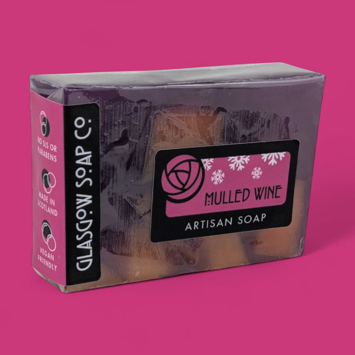 Artisan vegan handmade mulled wine soap bar with 'Glasgow Soap Co.' branding on a pink background