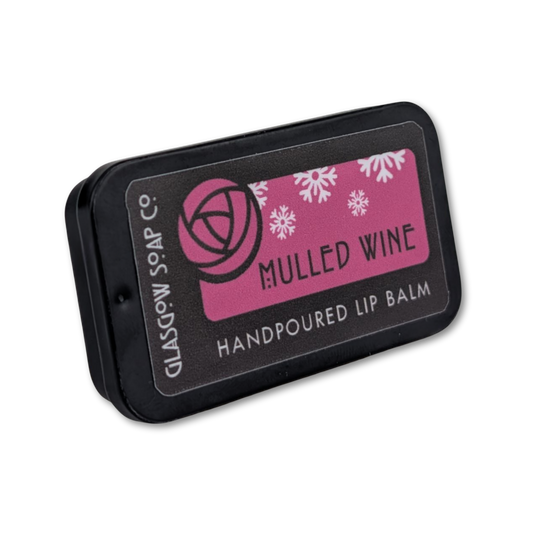 Lip balm container with 'Glasgow Soap Co' branding and 'Mulled Wine' text on a white background